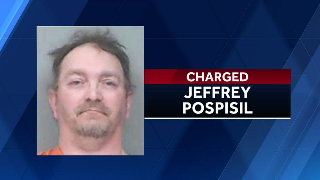 Custodian arrested, accused of taking pictures of students    