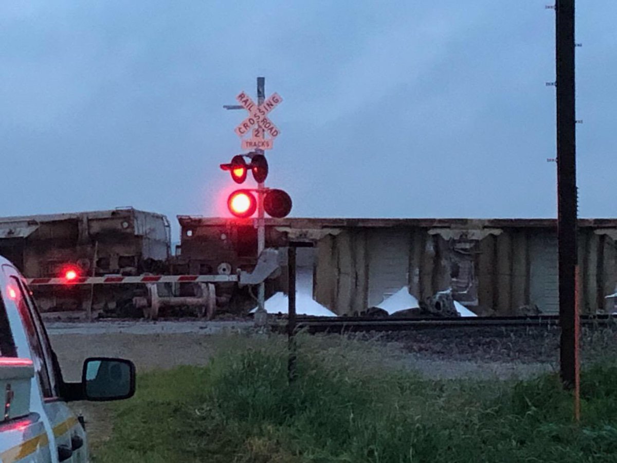 28 cars off the tracks after a train derailment at X Avenue and 370th Street just west of Belle Plaine in Tama County. Those are piles of sugar spilling out of them.
