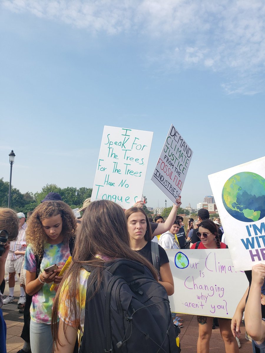 A selection of the creative signs found here at #ClimateStrike in Des Moines