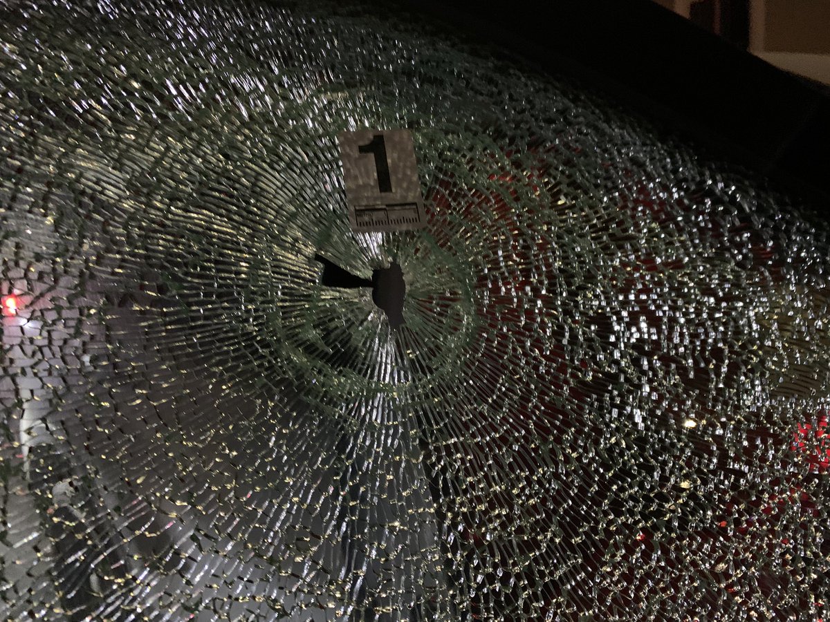 A Des Moines police officer was nearly hit by a stray bullet tonight just north of downtown. The bullet hit their car near 17th & University Avenue. It's believed to have been the result of a nearby drive-by shooting. 