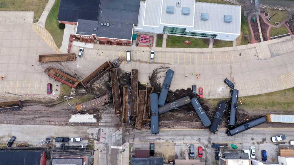 Train traffic resumed early Saturday in an eastern Iowa city a day after a derailment sent more than a dozen freight cars and tankers off the tracks just yards from the Mississippi River.
