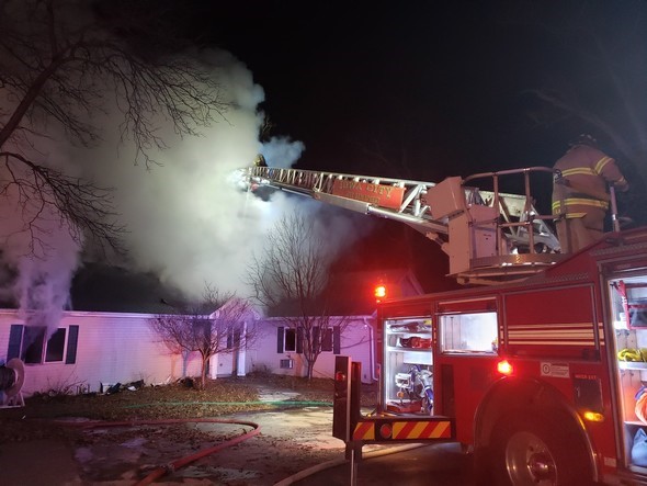 An early morning fire that was spotted from I-80 causes massive damage to a home in Iowa City