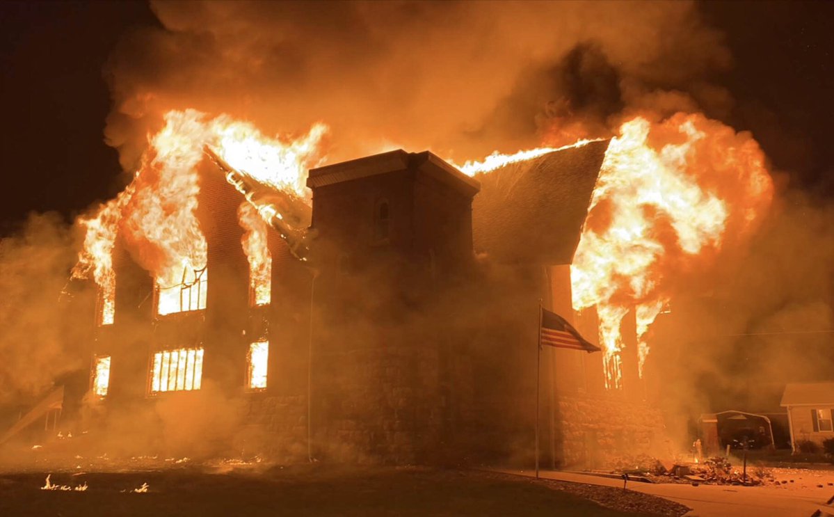 Fire crews from across Marion County are still working to put out the massive fire at Christian Church. these photos the progress made here in Pleasantville. Flames continue though to come from the basement.