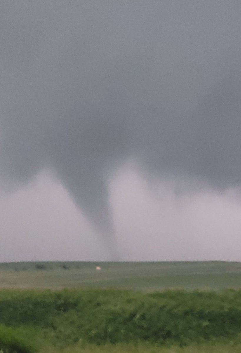Significant tornado outbreak ongoing in Iowa where at least  2 dozen twisters have touched down. These shots from Dan Joyce near Manchester, Iowa.